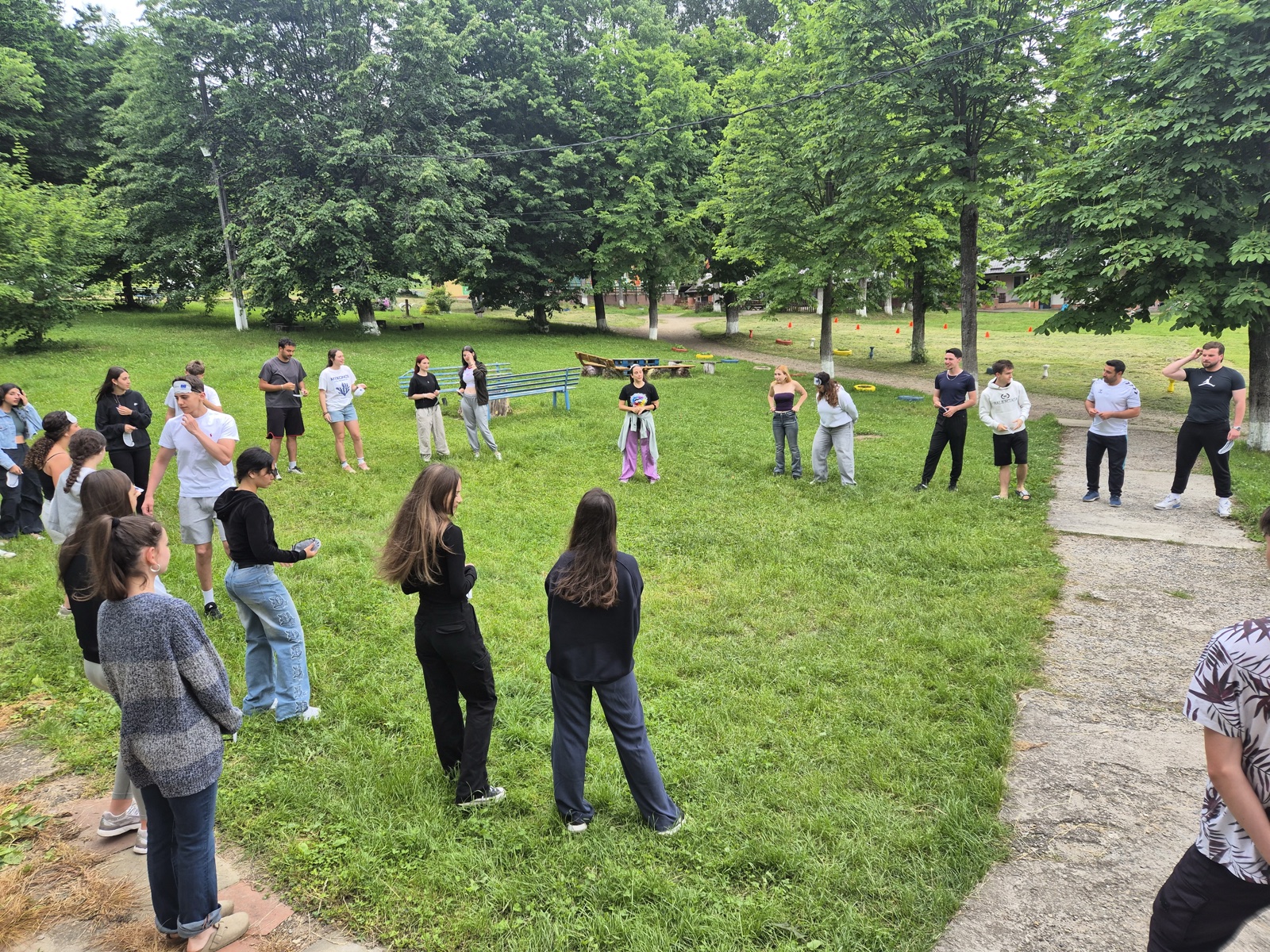Blindfolded pairs dance and high-five, guided only by their partners' voices