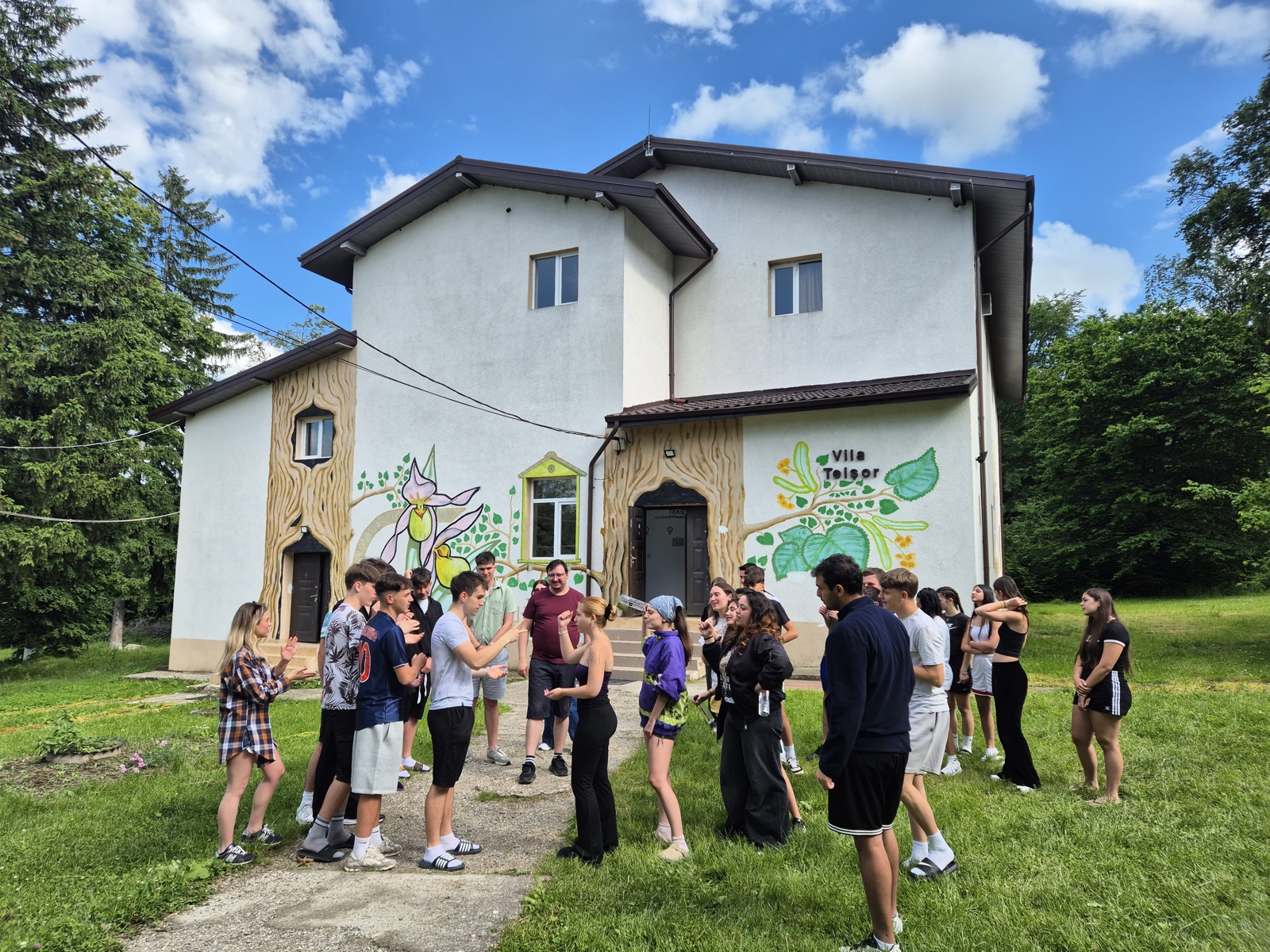 Sunny group photo at the villa after the tournament