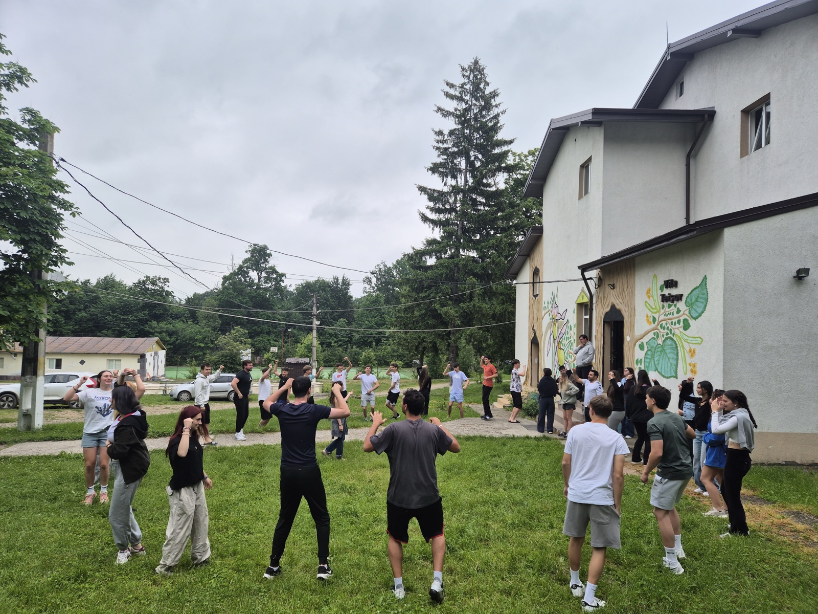 Morning energizer dance in front of the villa